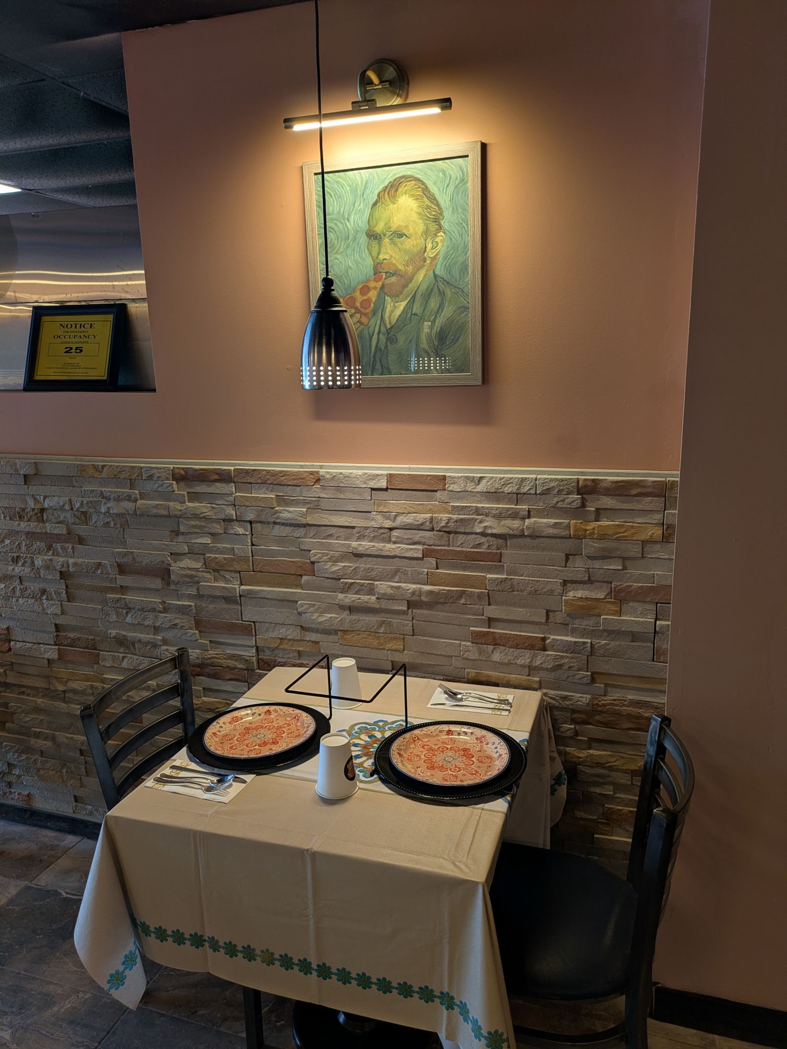 Van Gogh pizza art on the dining room wall