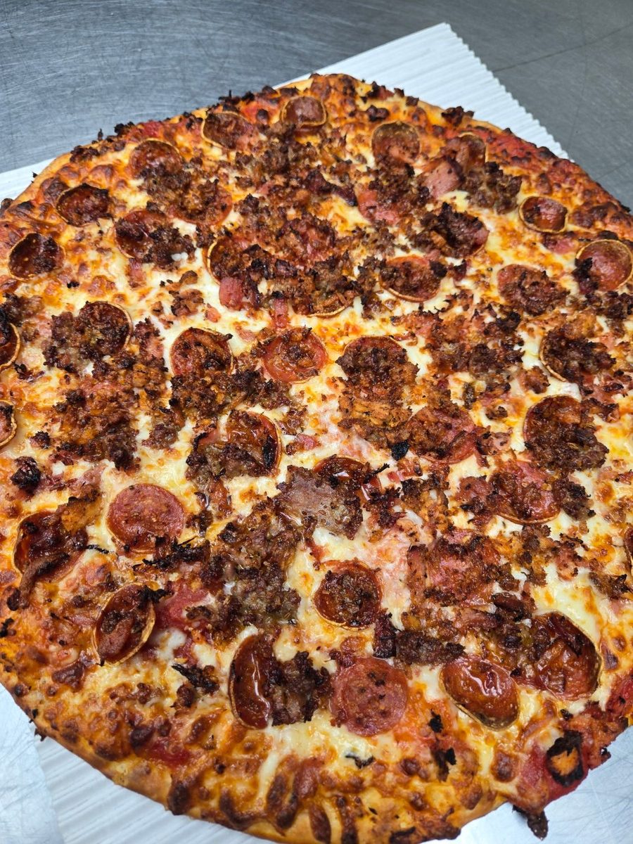 Meat pizza with pepperoni and sausage